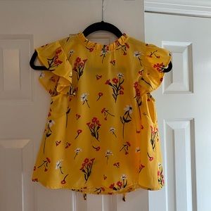 Very cute bright, flowery blouse!
